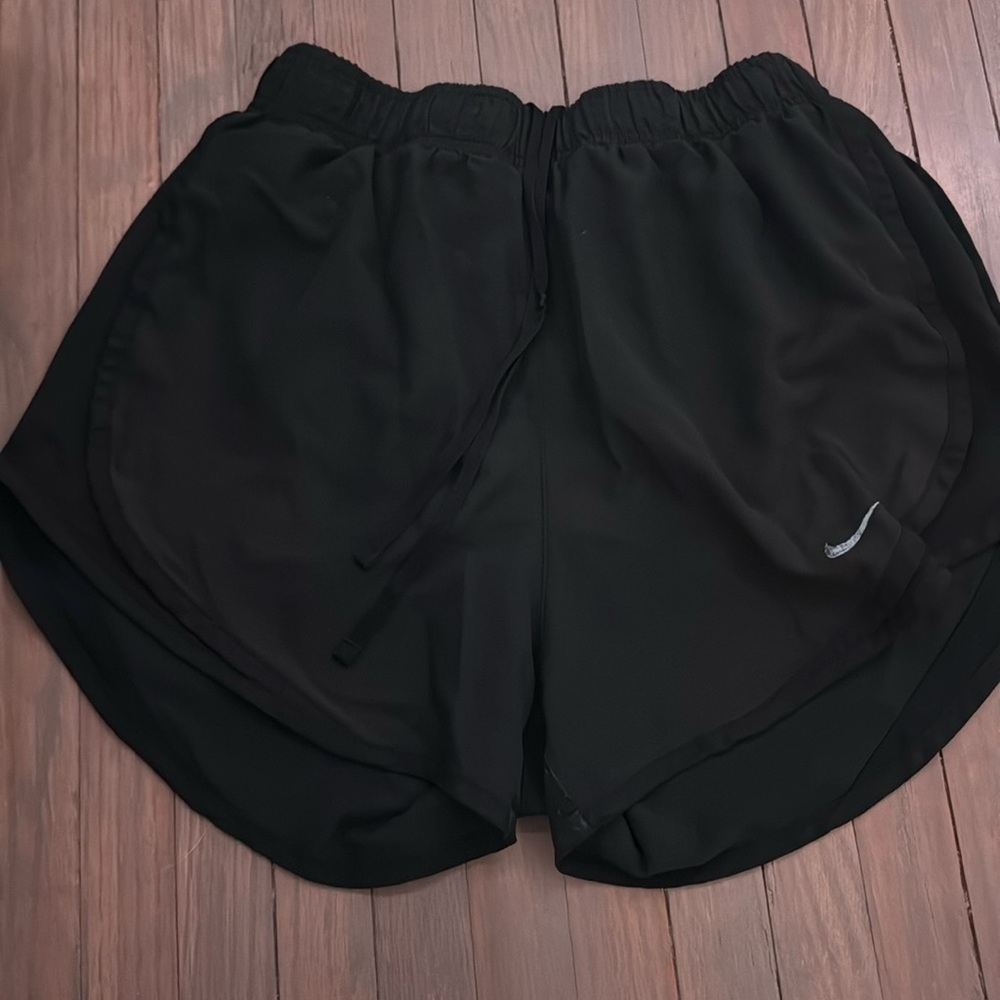 2 pairs of Nike shorts, gray and black, black pair is small and gray pair is XS
